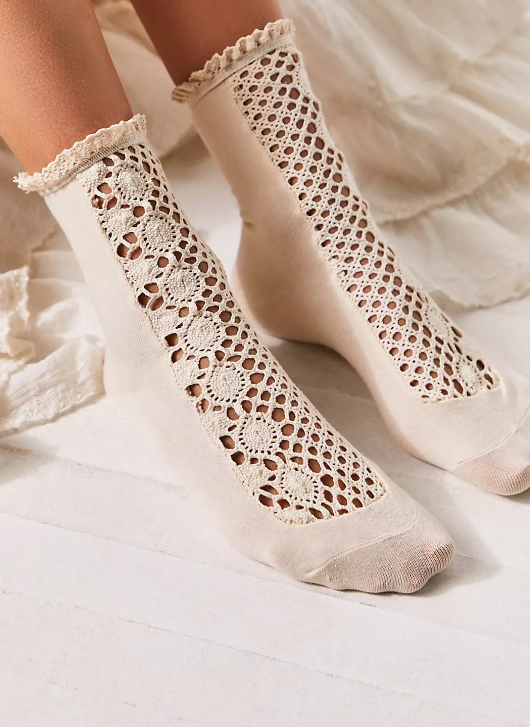 Up close view of model wearing the Free People Rubies Crochet Socks.