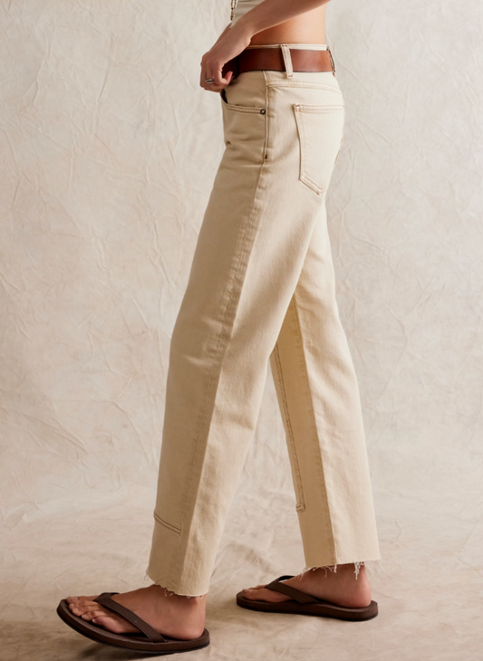 Model is wearing the Risk Take Mid-Rise Straight in Ecru