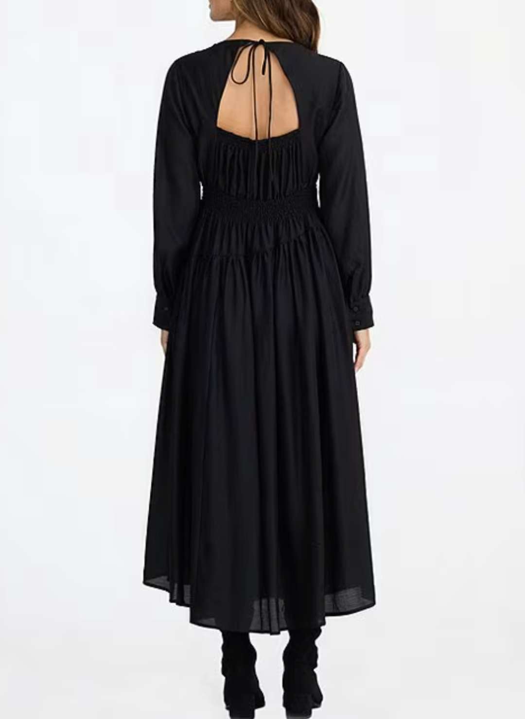 Black long-sleeve dress with open back on a white background