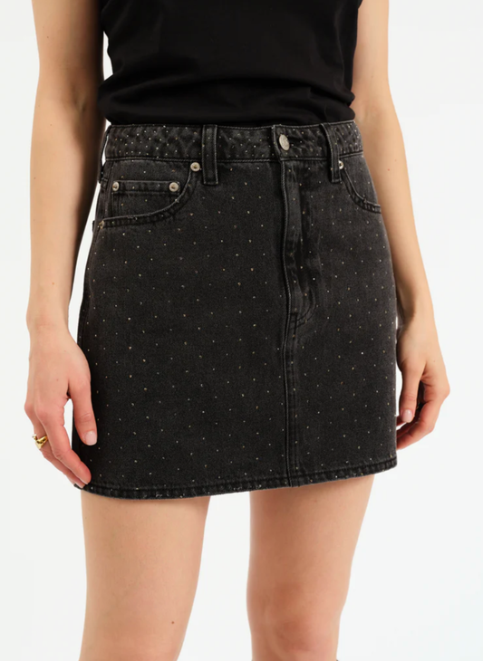 Front view of Daze Sparkle Stash Denim Skirt in Starlit Night with metallic stud detailing.