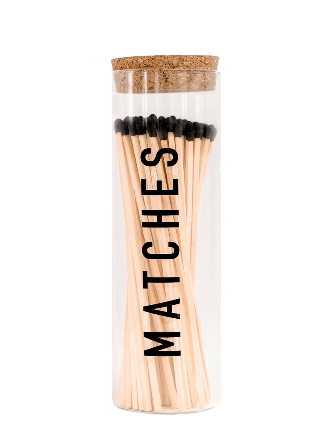 White background. Tall glass round canister for 7" matches.  Front of glass jar says "MATCHES" in black lettering.  Cork top.
