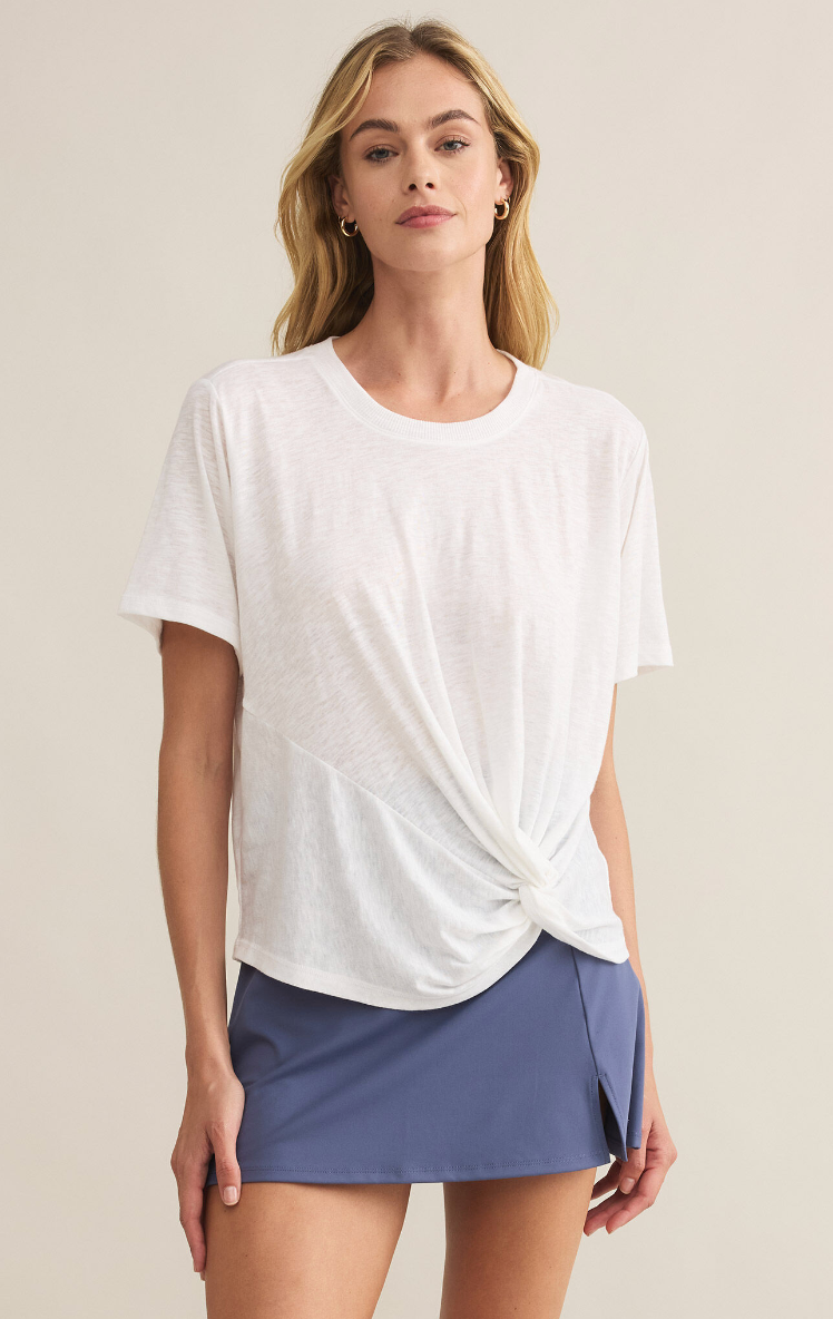 Front view of model wearing the Z Supply Twisted Up Top. Model is standing in front of a white background.