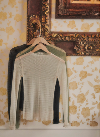 Front view of Free People Minding My Business Mesh Top in ivory featuring sheer long sleeves 