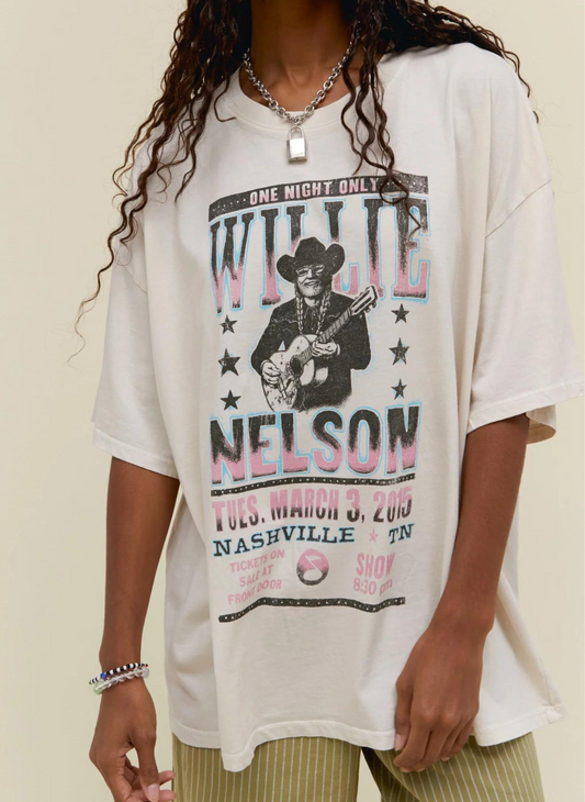 Model wearing a cream colored Willie One Night Tee featuring a vintage "band poster" graphic of Willie Nelson.