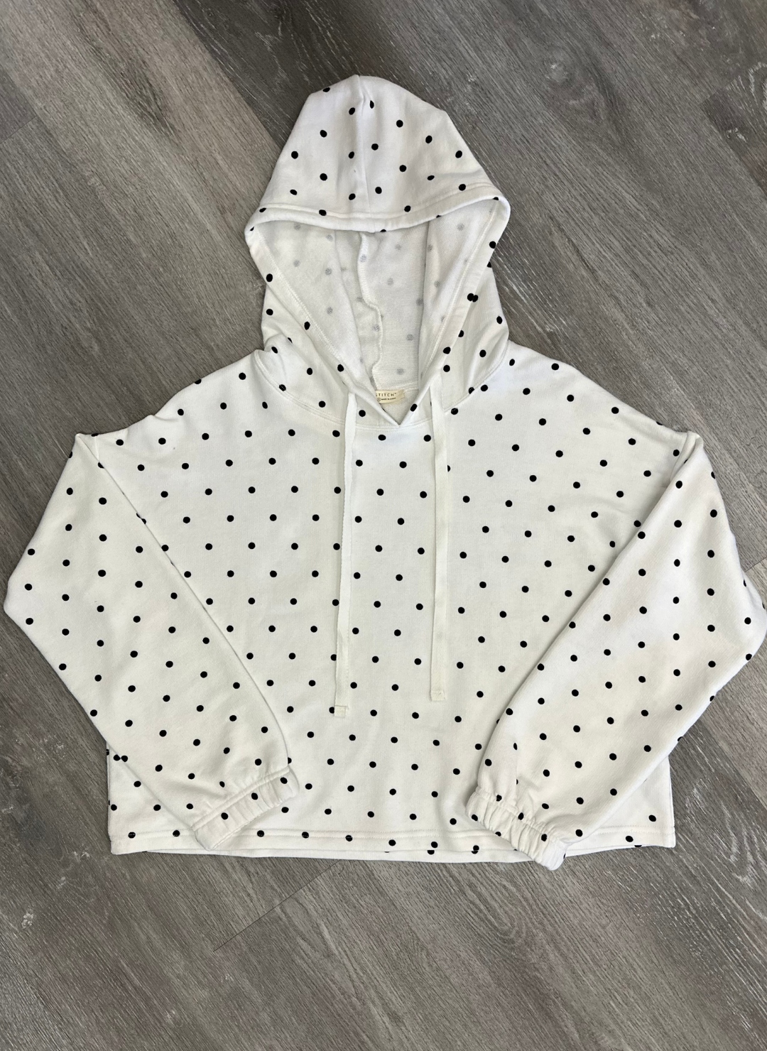 Full front view of the LS Polka Dot Princess Pullover showing the hoodie, strings , cuffs on the sleeve, and polka dot pattern on the pullover.