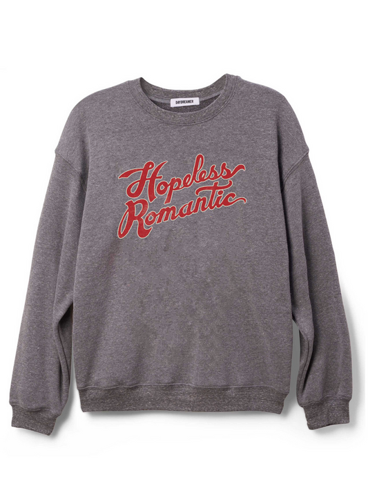 Front view of the DD Hopeless Romantic Sweater showing the wording on the front of the sweatshirt and the texture.