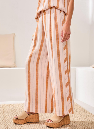 Tribal Morocco Striped Pant front view with wide-leg silhouette and warm-toned stripes.