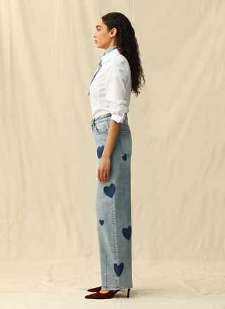 Side view of light blue stretch denim jeans showing flattering fit and classic styling