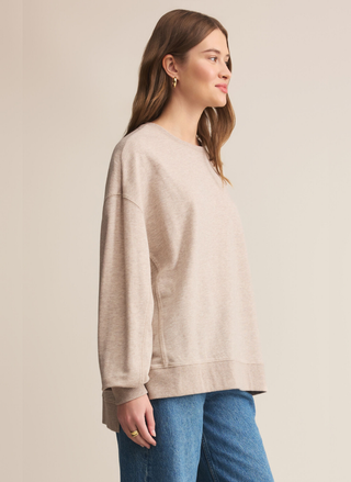 Side view of Z Supply Modern Weekender in taupe featuring crew neck, long sleeves, and burnout wash finish
