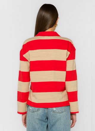 Back view of Velvet Heart red striped sweater showing side slits at hem and relaxed fit