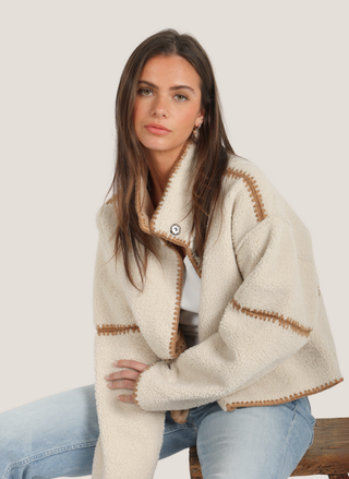 Front view of Dylan Casey Stitched Reversible Jacket in cream showing luxe faux suede side with elegant stitching detail