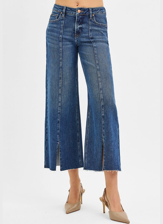 Front view of Risen Tummy Control Mid Rise Crop Wide Front Slit Jeans in dark wash.