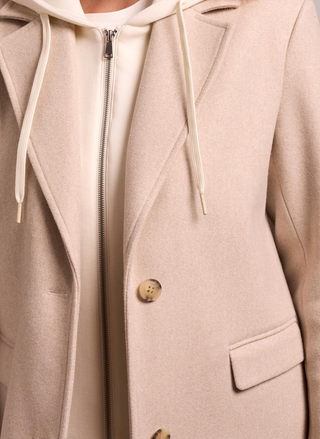 Close-up of pocket and button details on Tribal Tillie Trench.