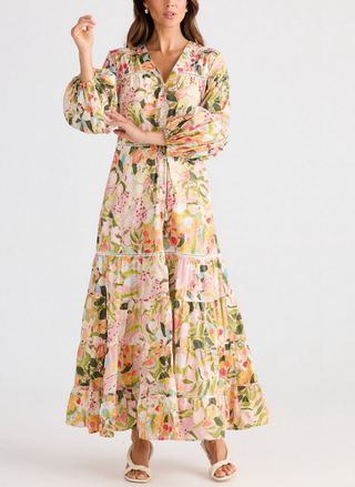 Woman wearing a floral dress on a white background