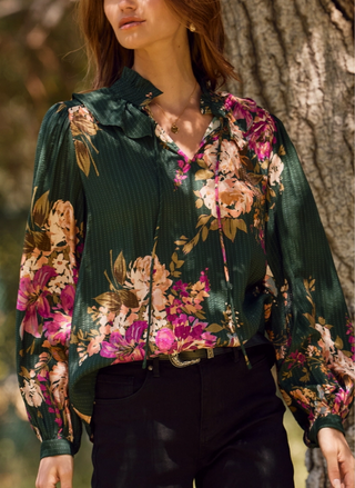 Front view of Oddi Garden Blast Blouse in green multi featuring floral print, ruffled neckline, and feminine tie detail