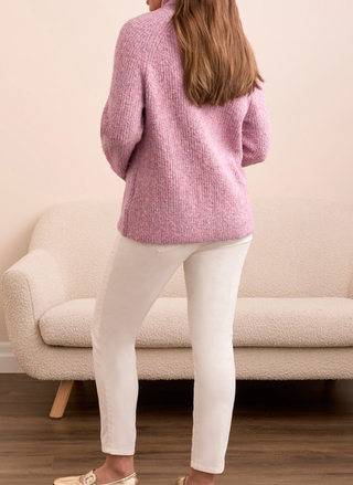 Back view of Tribal pink turtleneck sweater showing soft knit texture and elegant silhouette