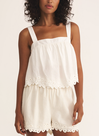 Model wearing Z Supply Annacy Tank and Pesaro Short set in ivory with scalloped embroidered trim, styled for summer.