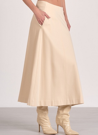 Elan Cynthia Midi Skirt in cream, side view with pockets, styled with heeled boots

Back view of Elan Cynthia Midi Skirt in cream, A-line silhouette with zip closure