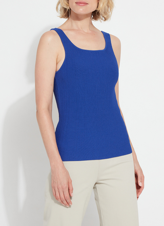 Woman wearing the Lyssé Avril Sculpting Tank in cobalt blue; ribbed texture with square neckline and wide straps, fitted through the torso. Available at August Boutique Ripon for stylish, sculpting everyday wear.