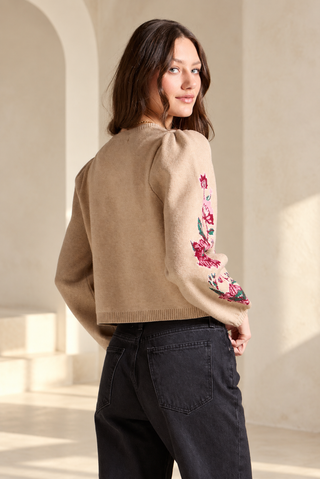 Women's natural cream cardigan by Saltwater Luxe with pink floral detail and voluminous gigot sleeves