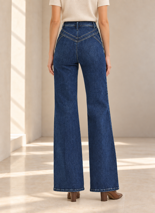 Women's dark wash high rise wide leg jeans with V yoke front by Risen