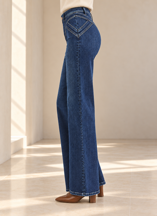 Risen dark wash stretch denim wide leg jeans with flattering V-shaped front yoke