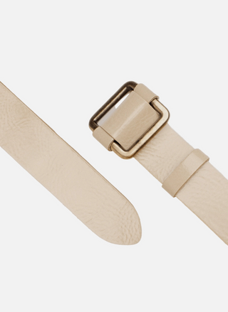 Up close image of the Pelle | Adjustable Gold Buckle Leather Slide Belt Women in front of a white background.