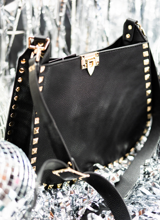 Image showing an up close view of the Black - The D'Vil Stud Bag.
