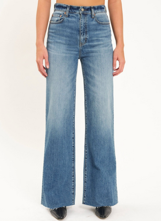 Front view of model wearing the DAZE Far Out High Rise Wide Leg Denim 