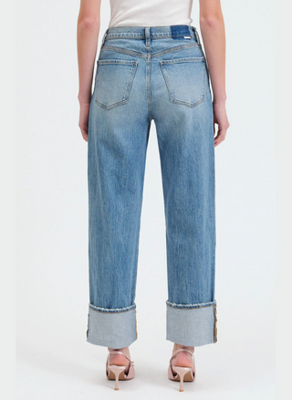 Back view of model wearing the DAZE Eastside High Rise Cuff Denim