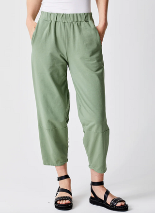 front view of the model wearing the Suzy D Jega Knit Joggers. Model is standing in front of white background. 