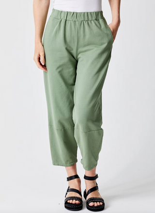 front view of the model wearing the Suzy D Jega Knit Joggers. Model is standing in front of white background. 