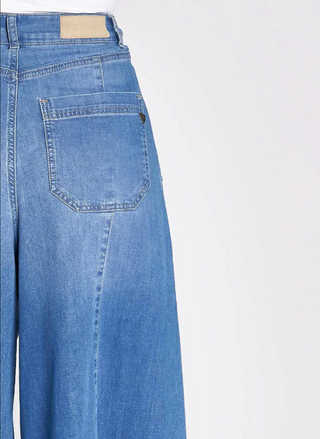 Back pocket view of the ZHrill Chatti Wide Leg Denim pant in front of a white background. 