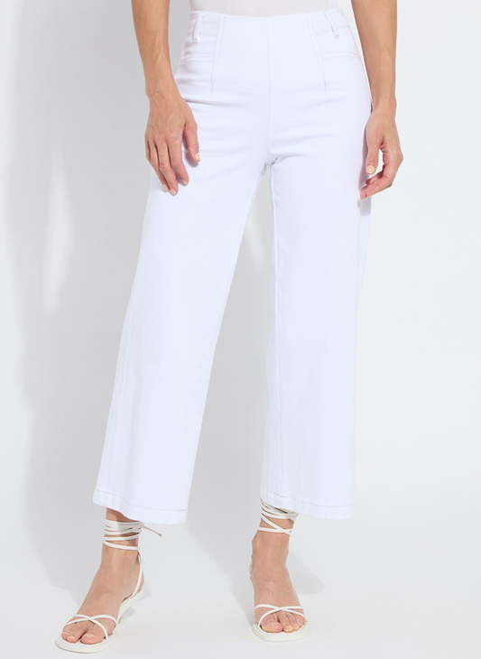 A model wears high-waisted white wide-leg cropped pants made of stretch denim-blend, featuring a clean pull-on waistband, front vertical seams, belt loops, and a hem that finishes above the ankle.
