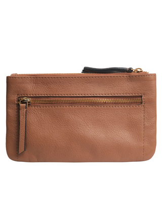 Tan upcycled leather crossbody bag by RISA with front zipper pocket, adjustable strap, and gold hardware – available at August Boutique Ripon.