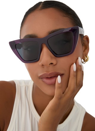 Image shows model wearing Windsor Amethyst purple and grey polarized sunglasses.