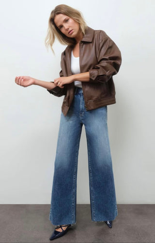 front view of model wearing the DAZE Far Out High Rise Wide Leg Denim 