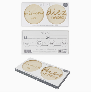 Image of packaging for the round wooden milestone prop cards.