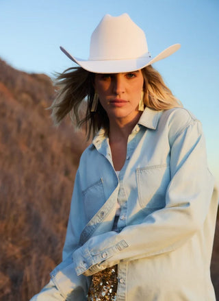 Women's light-wash denim button-up shirt with two chest pockets by Porter Blue