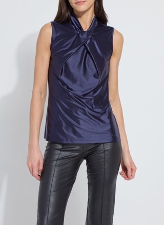 Model wearing Lyssé Branca Halter Draped Top in navy front view with pleated neckline.