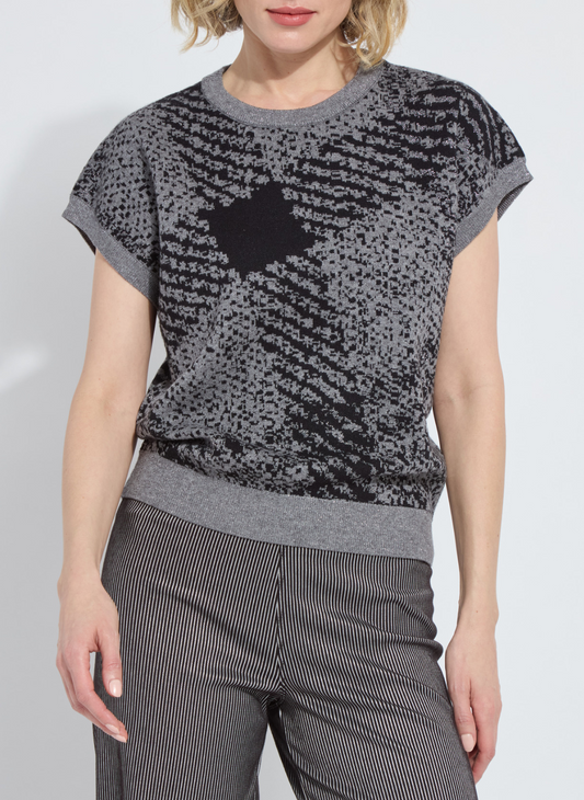 Front view of Lyssé Germaine Pullover Sweater in black and gray abstract pattern with ribbed hem.
