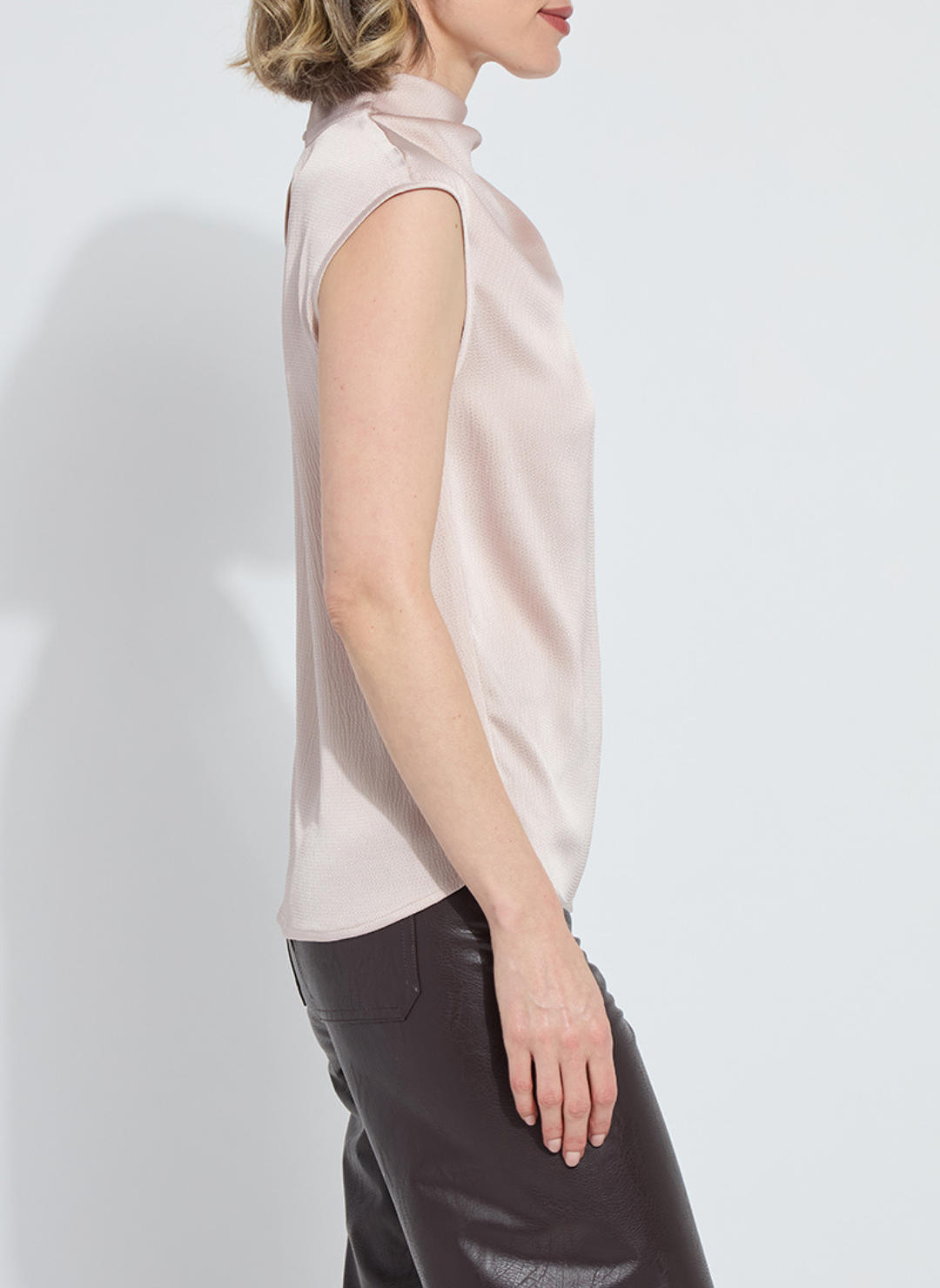 Side view of Lyssé Aisha Neck Draped Blouse in blush pink