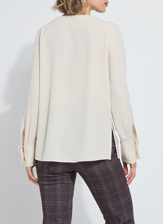 Back view of Lyssé Talita French Cuff Blouse showing relaxed straight fit
