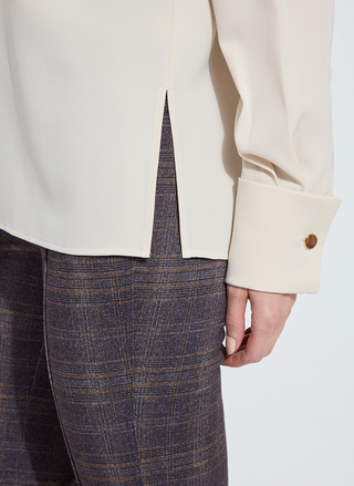 Close-up of French cuff detail on Lyssé Talita Blouse with gold button