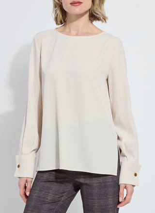 Front view of Lyssé Talita French Cuff Blouse in cream with plaid trousers