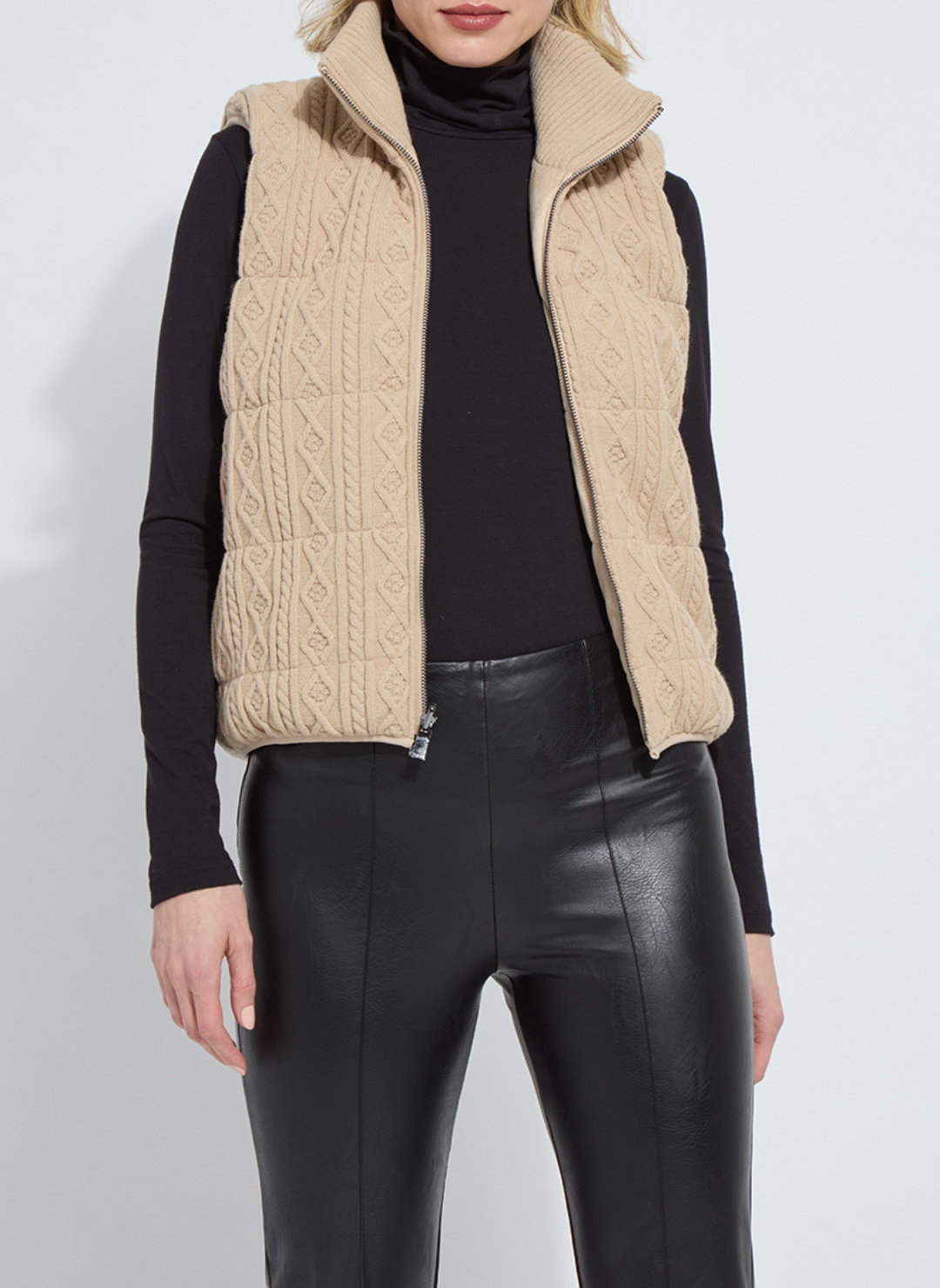 Woman wearing Lyssé Petra Reversible Puffer Sweater Vest sweater knit side front view
