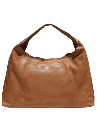 Back view of the Latico Lindsey Laser Cut Leather Tote with wide strap, magnetic closure, and hidden phone pocket