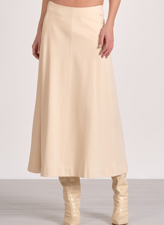 Cream midi skirt by Elan styled with boots, chic neutral wardrobe staple