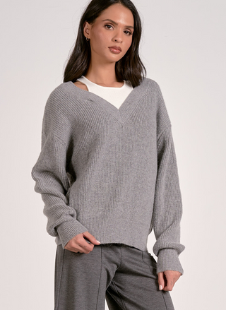 Front view of Elan Café Society Sweater in grey with layered white neckline insert.