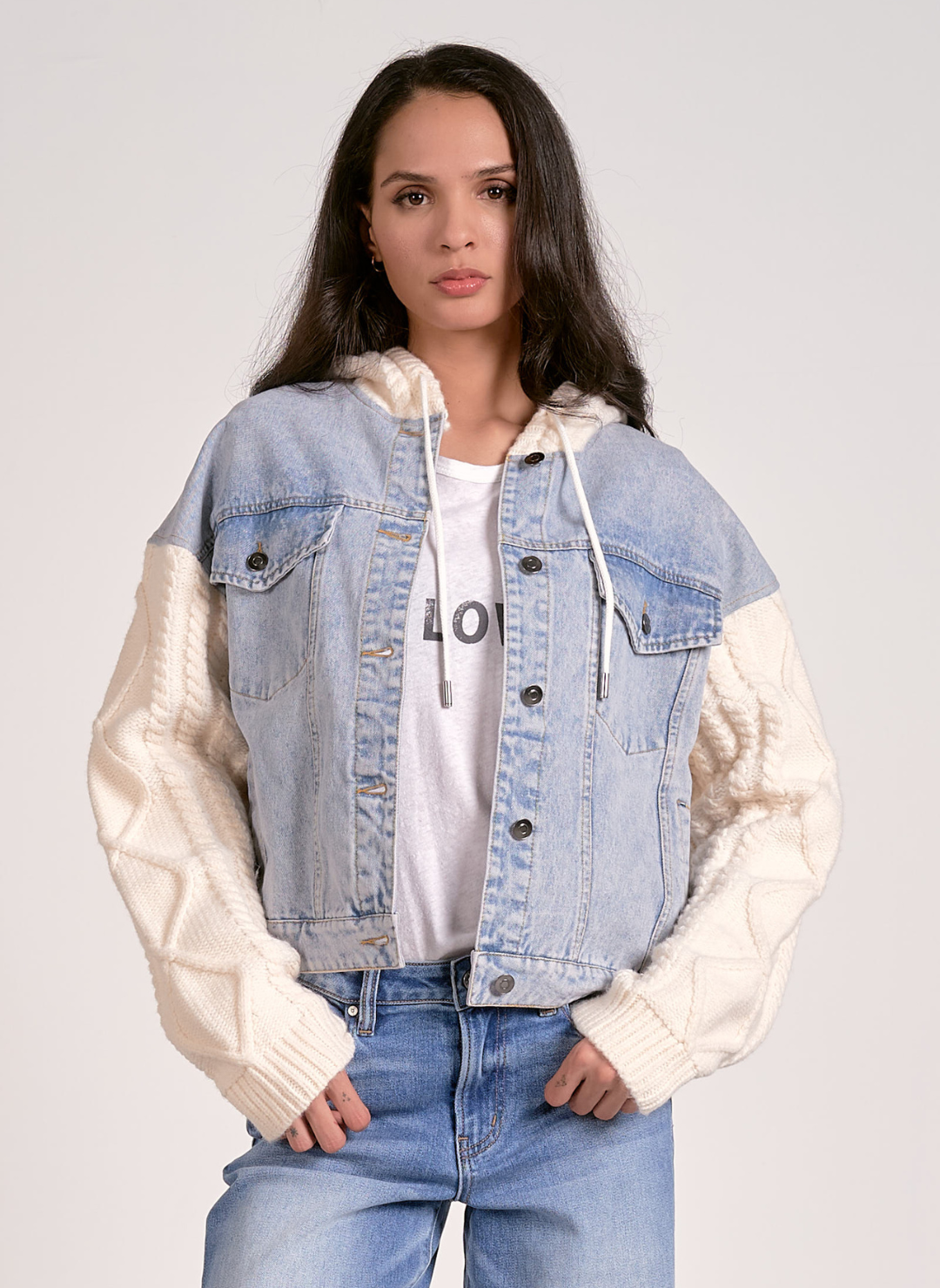 Front view of Elan Knitted Denim Hooded Jacket with denim body and cream knit sleeves.